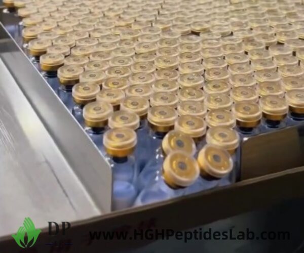 Bulk tray of GHK-Cu vials on packaging line