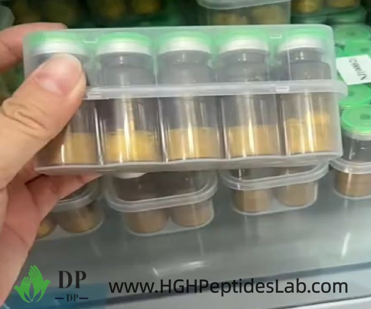 Hand holding a NAD PLUS research vial close up