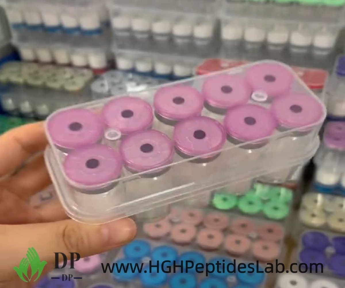 Hand holding a Tirzepatide research vial close up