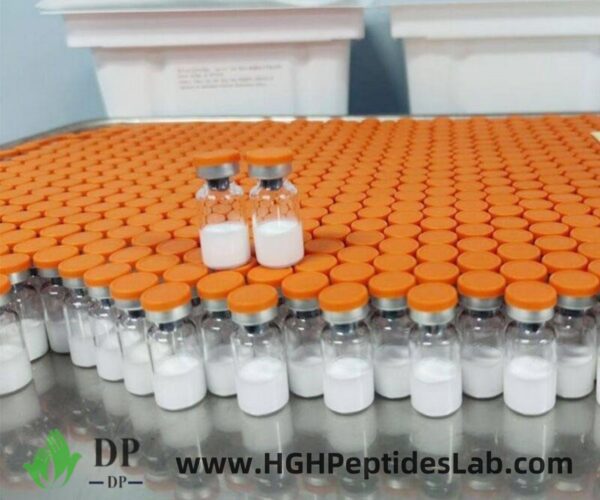 Лоток с оранжевой крышкой тирзепатида vials на производственной линии