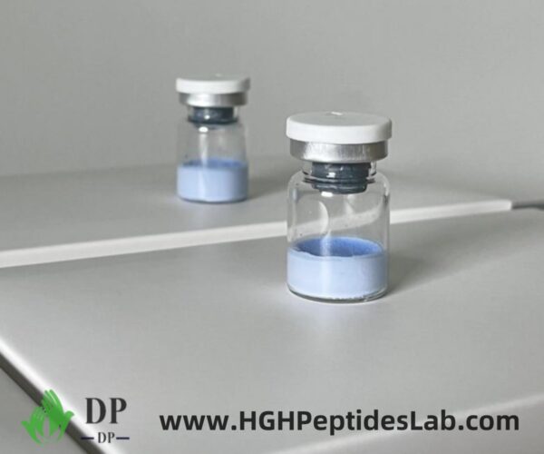 Triple-blend peptide vial close-up — lyophilized powder
