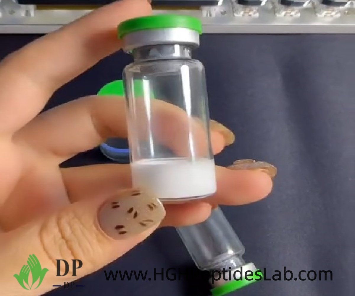 Hand holding a Thymosin Alpha-1 research vial close up